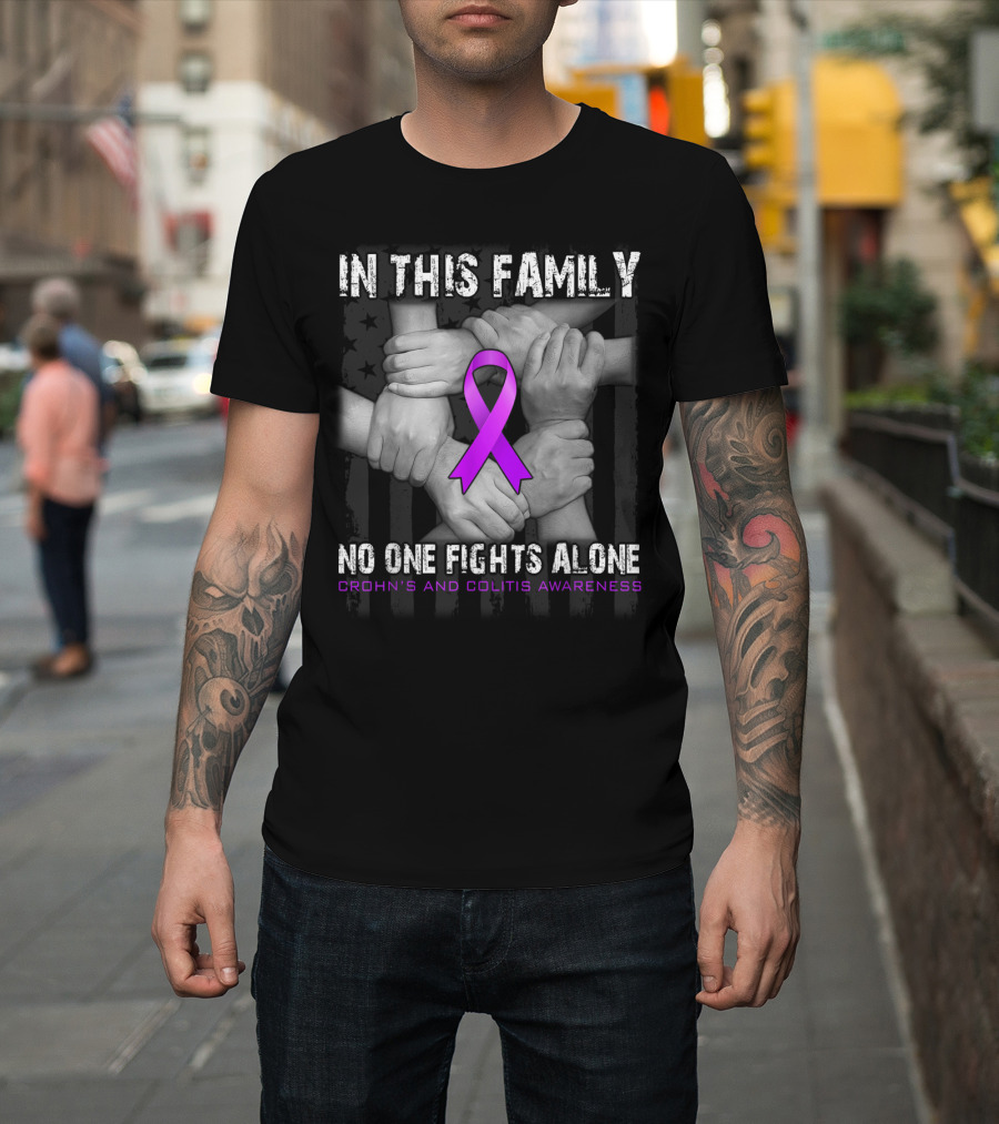 IN THIS FAMILY NO ONE FIGHTS ALONE CROHN'S AND COLITIS AWARENESS PURPLE RIBBON HANDS UNITED T-Shirt