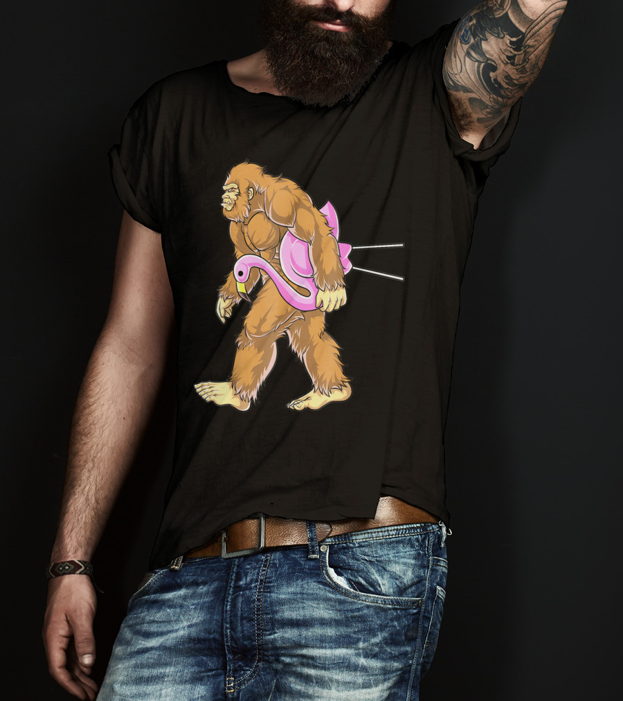 Bigfoot Carrying Pink Lawn Flamingo Humorous Sasquatch Image T-Shirt