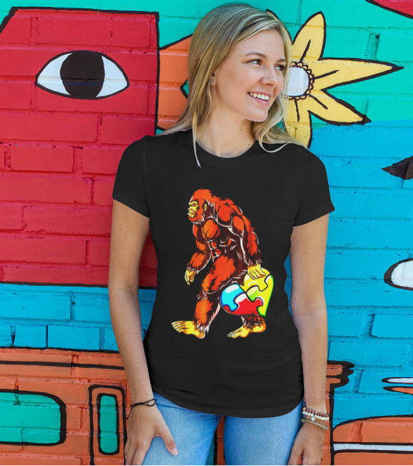 Bigfoot Holding Heart-Shaped Puzzle Piece For Autism Awareness T-Shirt