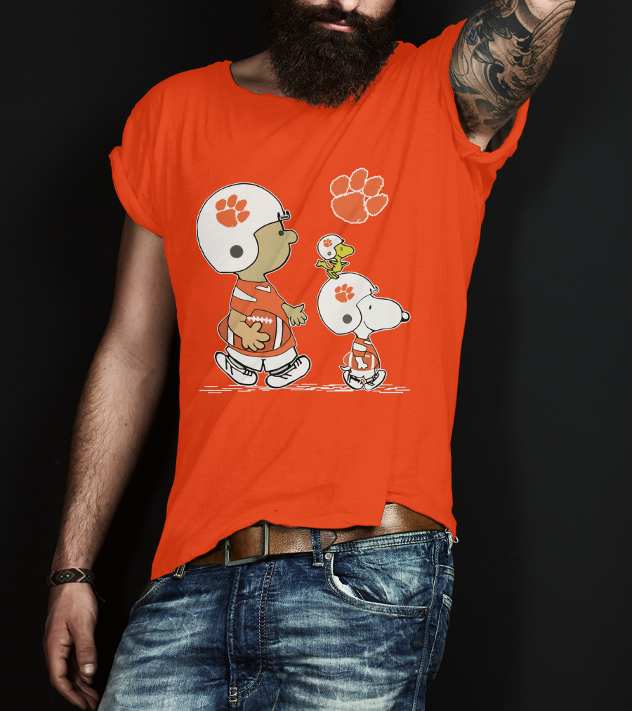 Clemson Tigers Snoopy Football Helmets And Paw Print Charlie Brown Woodstock T-Shirt