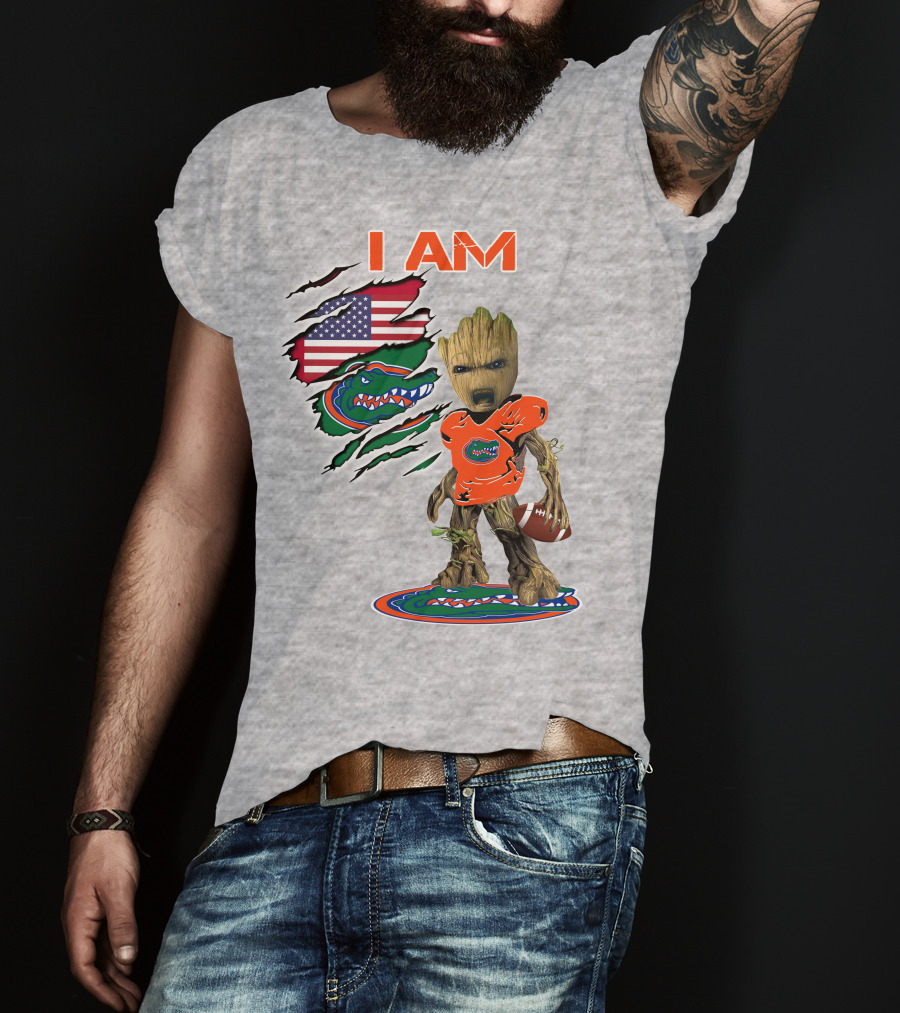 I Am Gators Baby Groot Holding Football With American Flag And Florida Gators T-Shirt