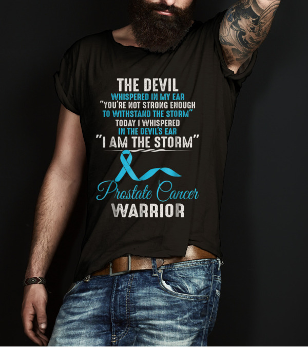 The Devil Whispered You’re Not Strong Enough To Withstand The Storm Prostate Cancer Warrior I Am The Storm T-Shirt