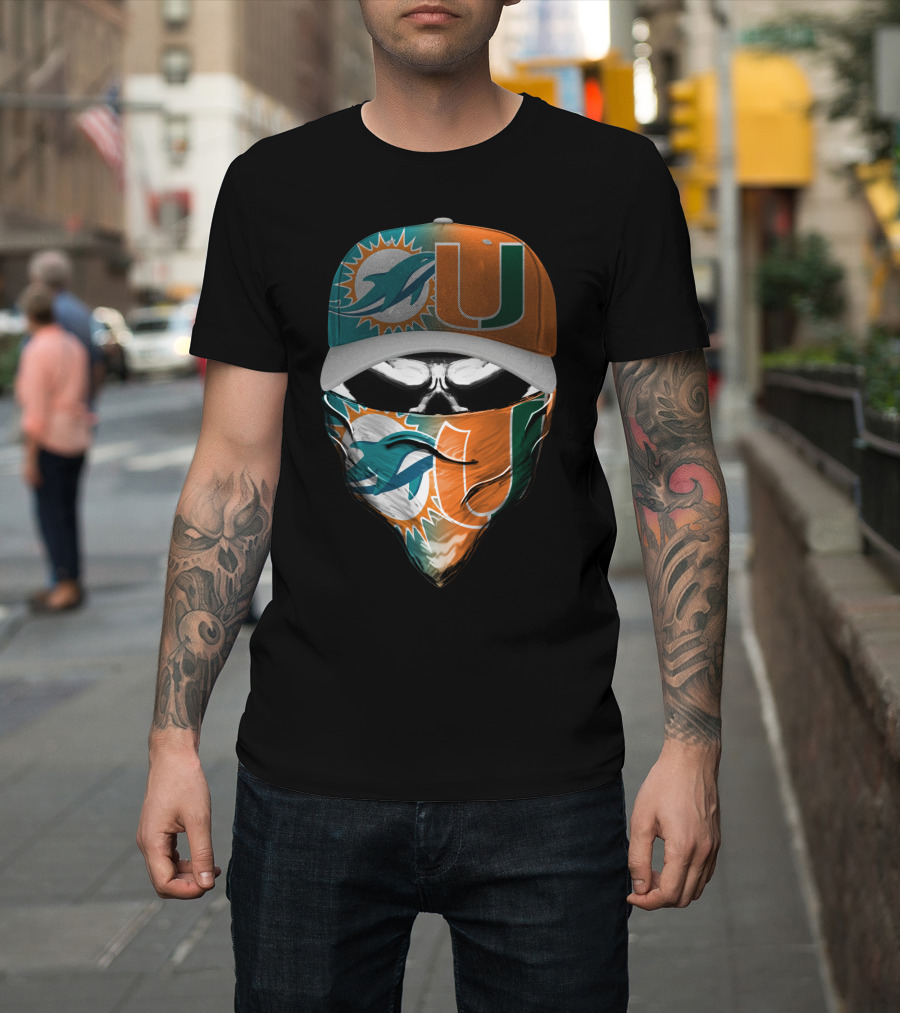 Miami Dolphins And University Of Miami Logo Face Mask And Cap Design Skull Style T-Shirt
