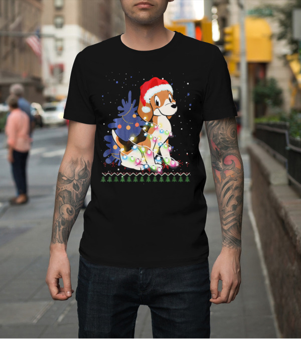 Shirt: Beagle Wrapped in Christmas Lights with Santa Hat Beside Decorated Christmas Tree and Snowflakes T-Shirt Beagle Wrapped in Christmas Lights with Santa Hat Beside Decorated Christmas Tree and Snowflakes T-Shirt
