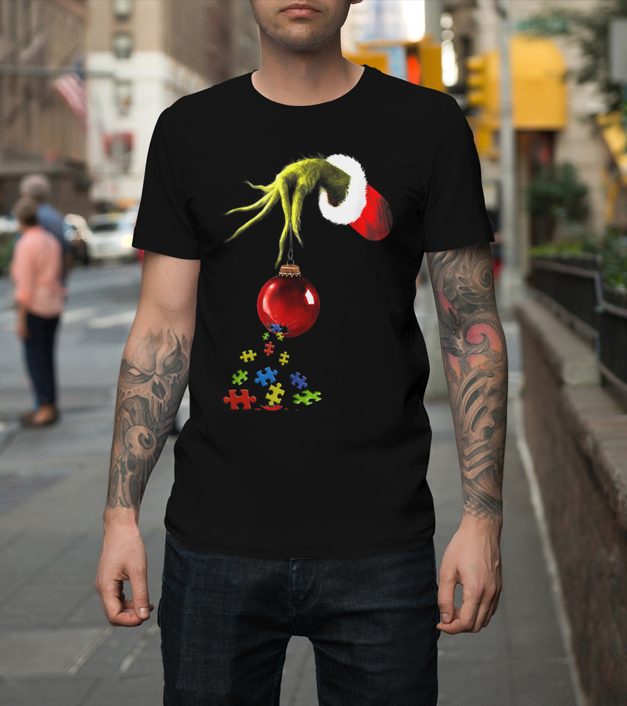 Grinch Hand Holding Red Ornament With Autism Puzzle Pieces T-Shirt