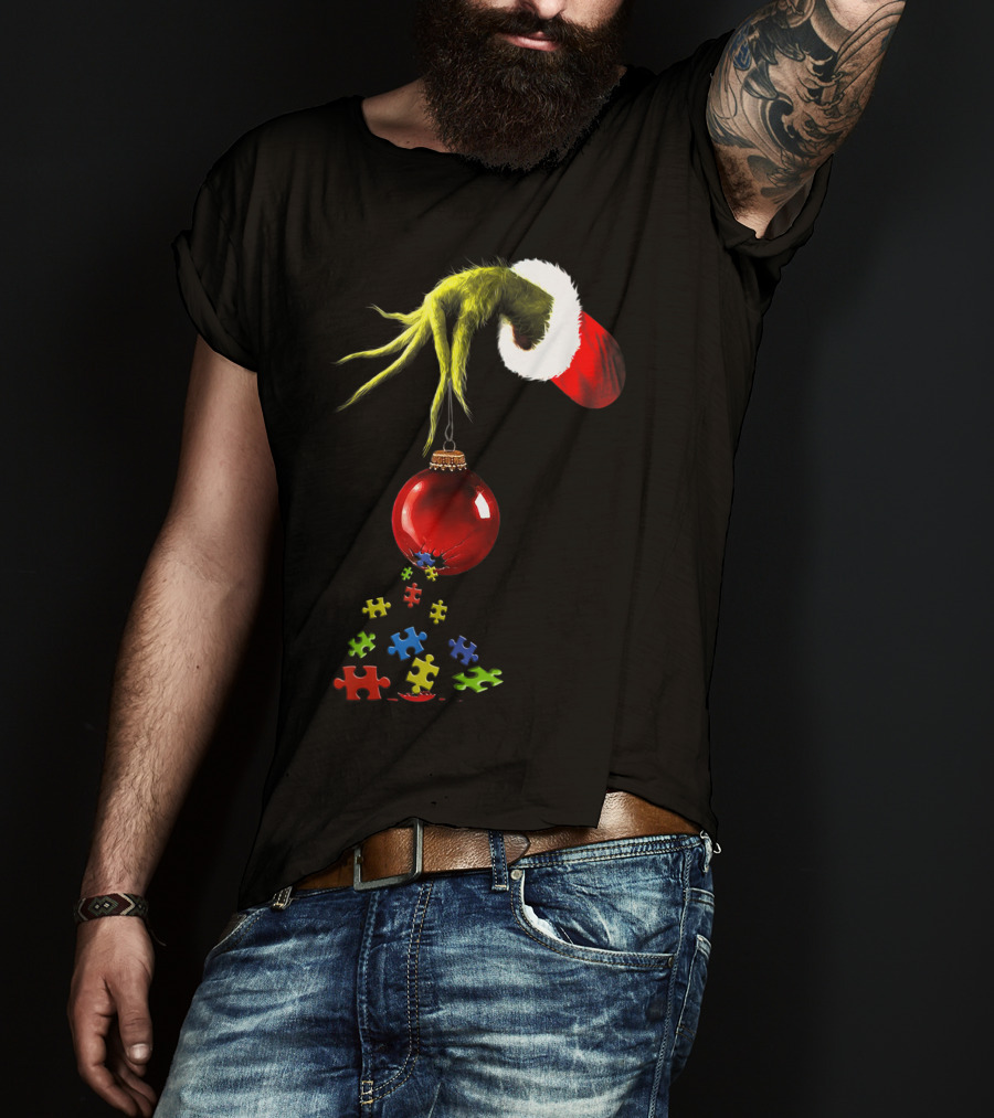 Grinch Hand Holding Red Ornament With Autism Puzzle Pieces T-Shirt