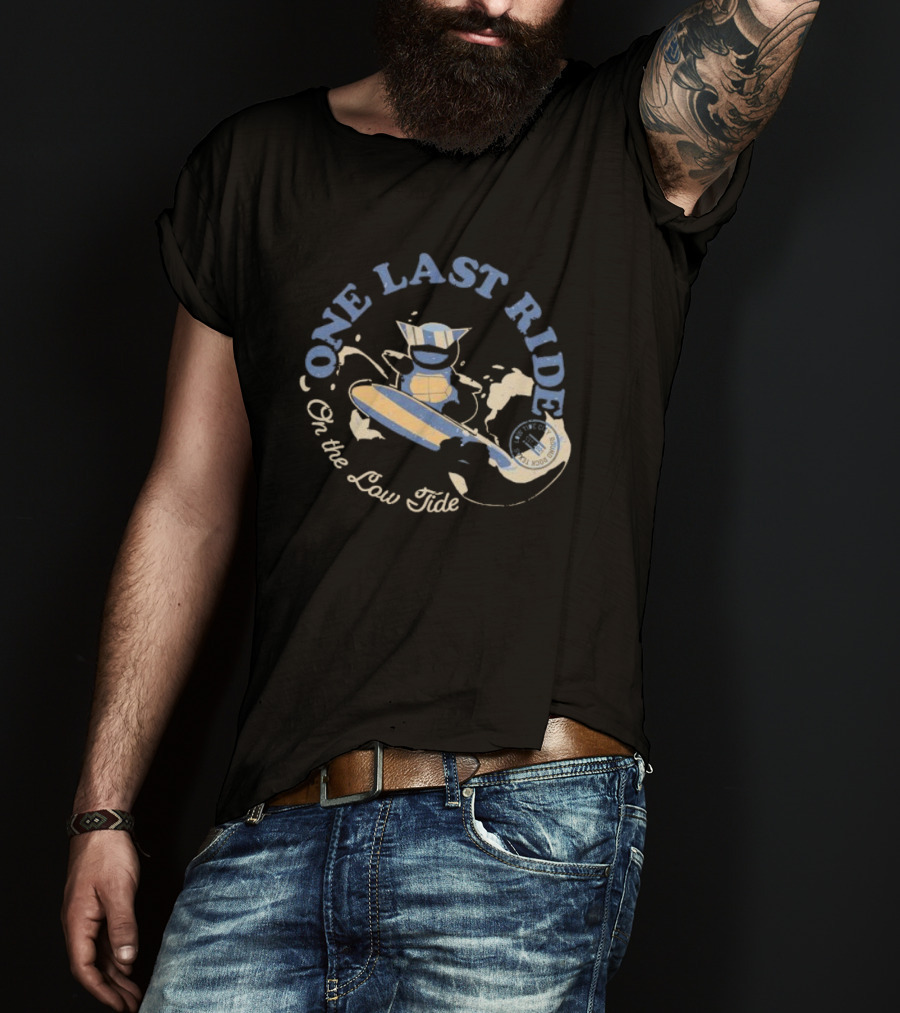 Surfing Adventure With Blue Masked Figure And Iconic Board 'One Last Ride On The Low Tide' T-Shirt