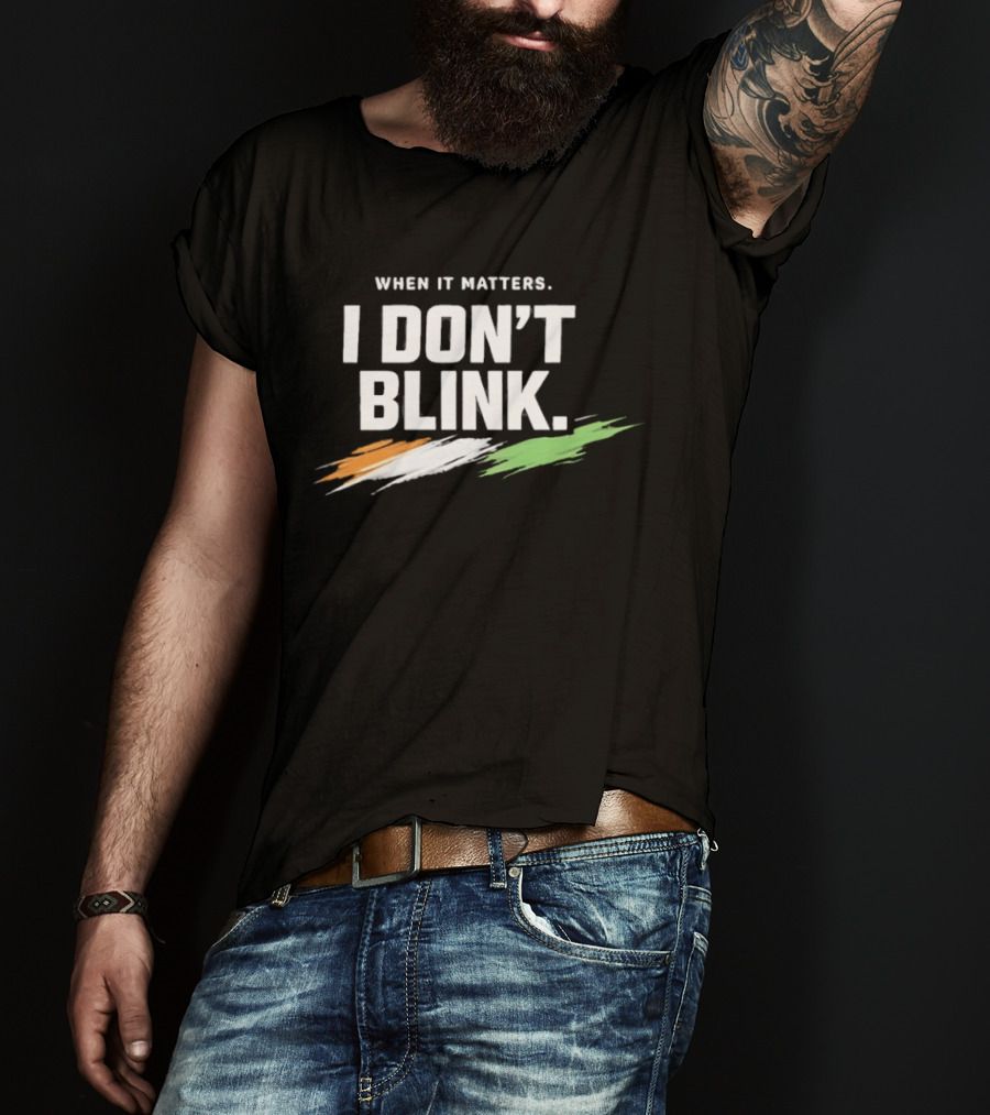 When It Matters I Don't Blink Bold Text With Orange White Green Brush Strokes T-Shirt