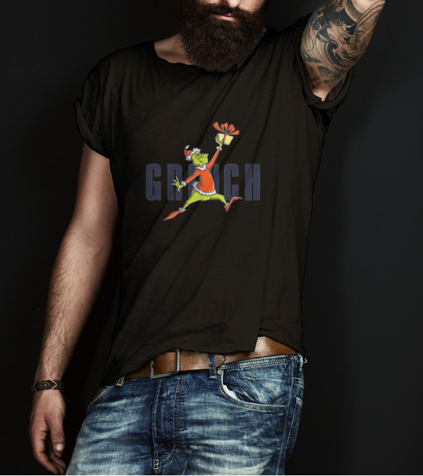 Grinch Santa Hat Holding Gift Jumping Over Large Text T-Shirt