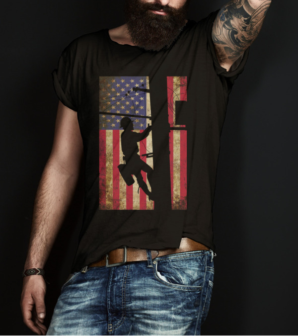 Lineman Climbing Electric Pole Against American Flag Background T-Shirt