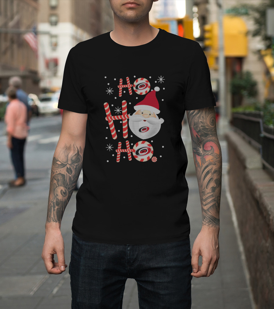 Ho Ho Ho Santa Claus With Candy Canes And Carolina Hurricanes Logo Christmas Fans T-Shirt