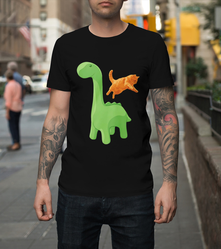 Cat Jumping Over Green Dinosaur Cartoon Image T-Shirt