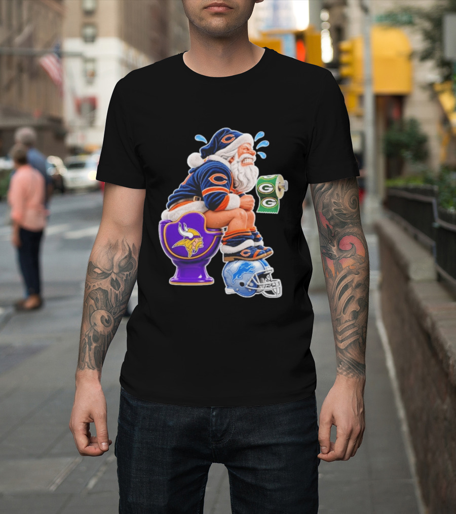 Santa Claus On Toilet Minnesota Vikings Detroit Lions Green Bay Packers Chicago Bears Funny Christmas 2026 Football T-Shirt