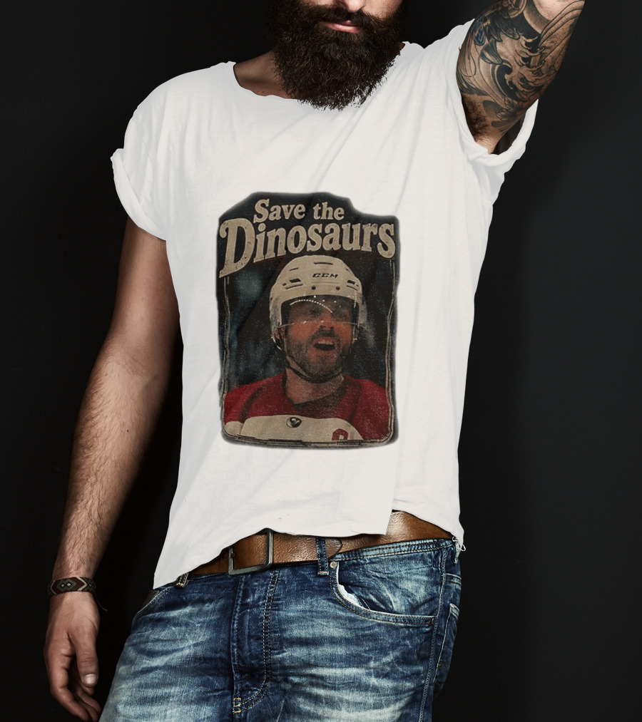 Connor Storrie Wearing Scott Hunter Save The Dinosaurs CCM Hockey T-Shirt