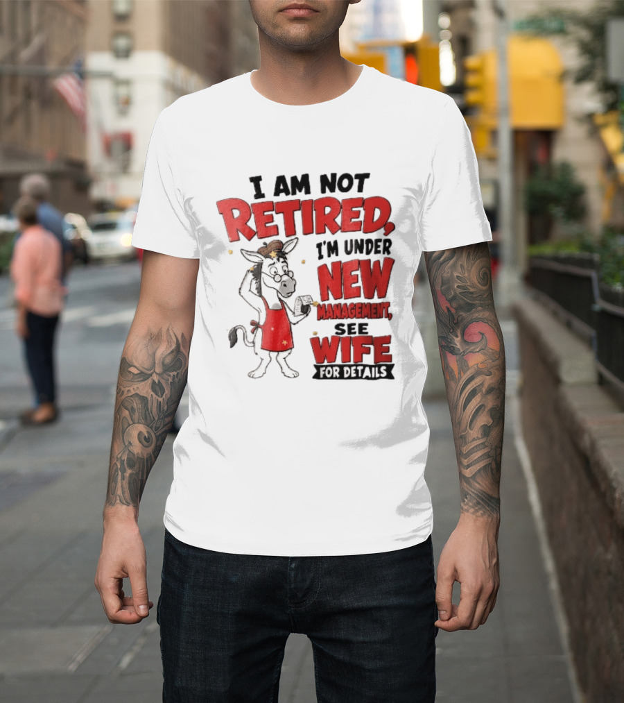 I Am Not Retired I'm Under New Management See Wife For Details Cartoon Donkey Red Apron T-Shirt