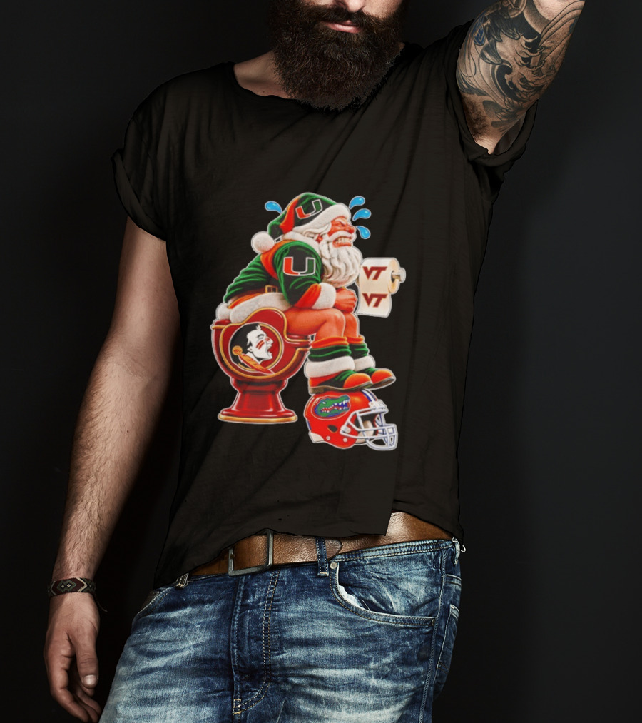Miami Hurricanes Santa Claus Laughing On Florida State Toilet With Virginia Tech Toilet Paper And Florida Gators Helmet T-Shirt