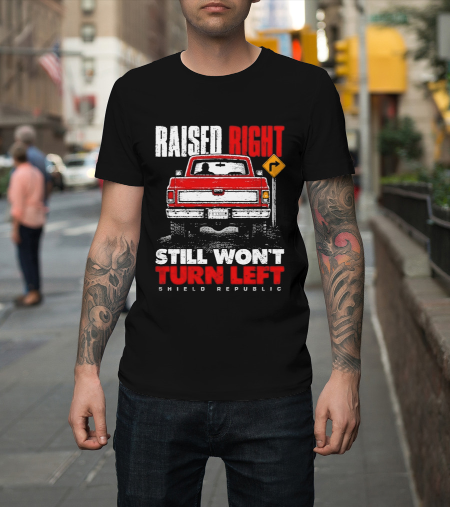 Raised Right Still Won't Turn Left Shield Republic Truck Back View With Right Turn Sign T-Shirt