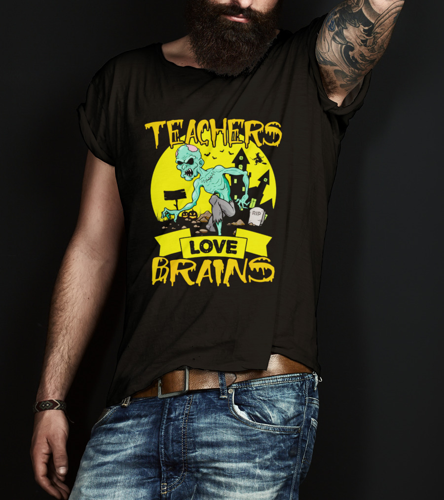 Teachers Love Brains Zombie Halloween Theme With Haunted Houses And Graveyard Background T-Shirt