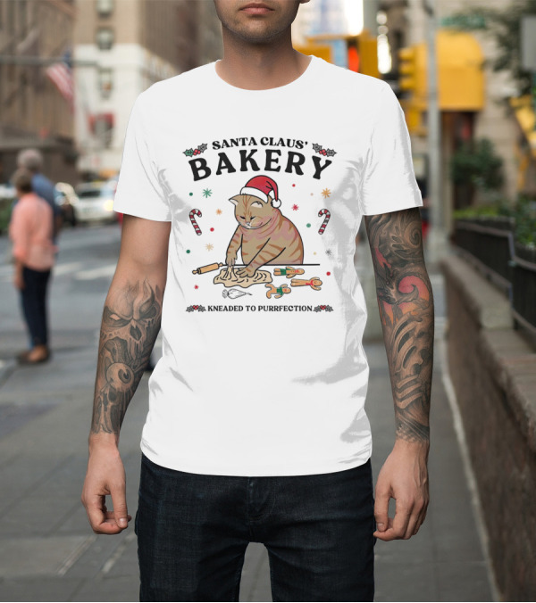Shirt: Santa Claus' Bakery Kneaded to Purrfection Cat with Santa Hat Making Cookies T-Shirt Santa Claus' Bakery Kneaded to Purrfection Cat with Santa Hat Making Cookies T-Shirt