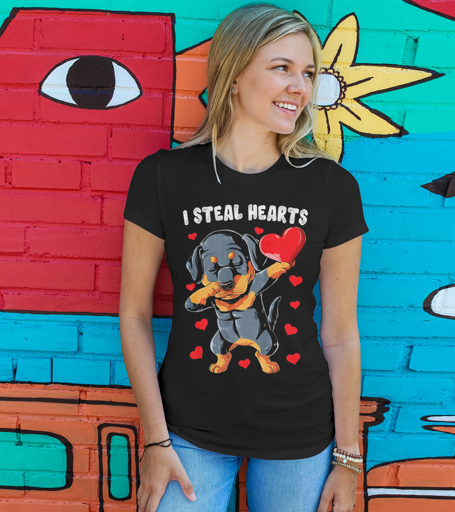Dabbing Rottweiler Holding Heart Surrounded By I Steal Hearts Text T-Shirt