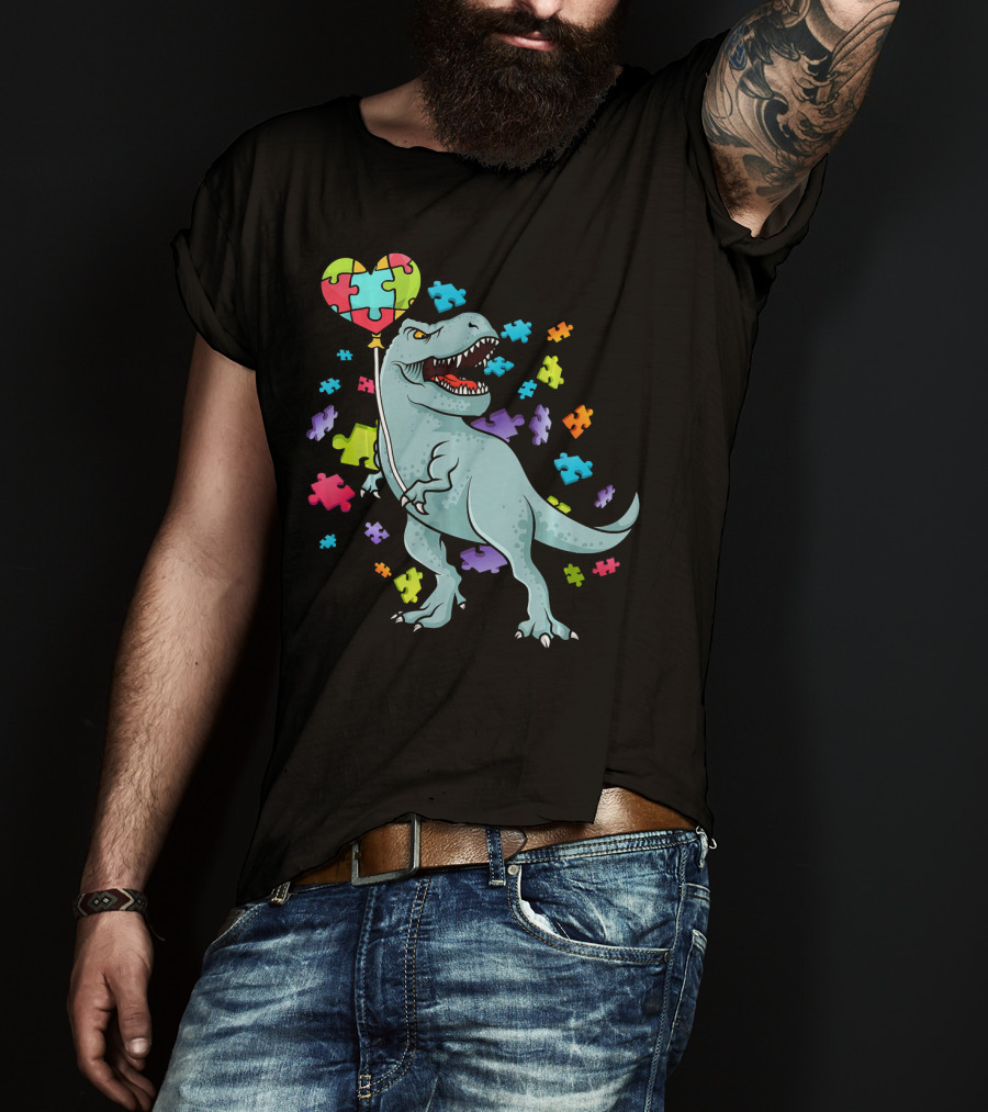 Autism Awareness Dinosaur With Puzzle Heart Balloon And Colorful Puzzle Pieces T-Shirt