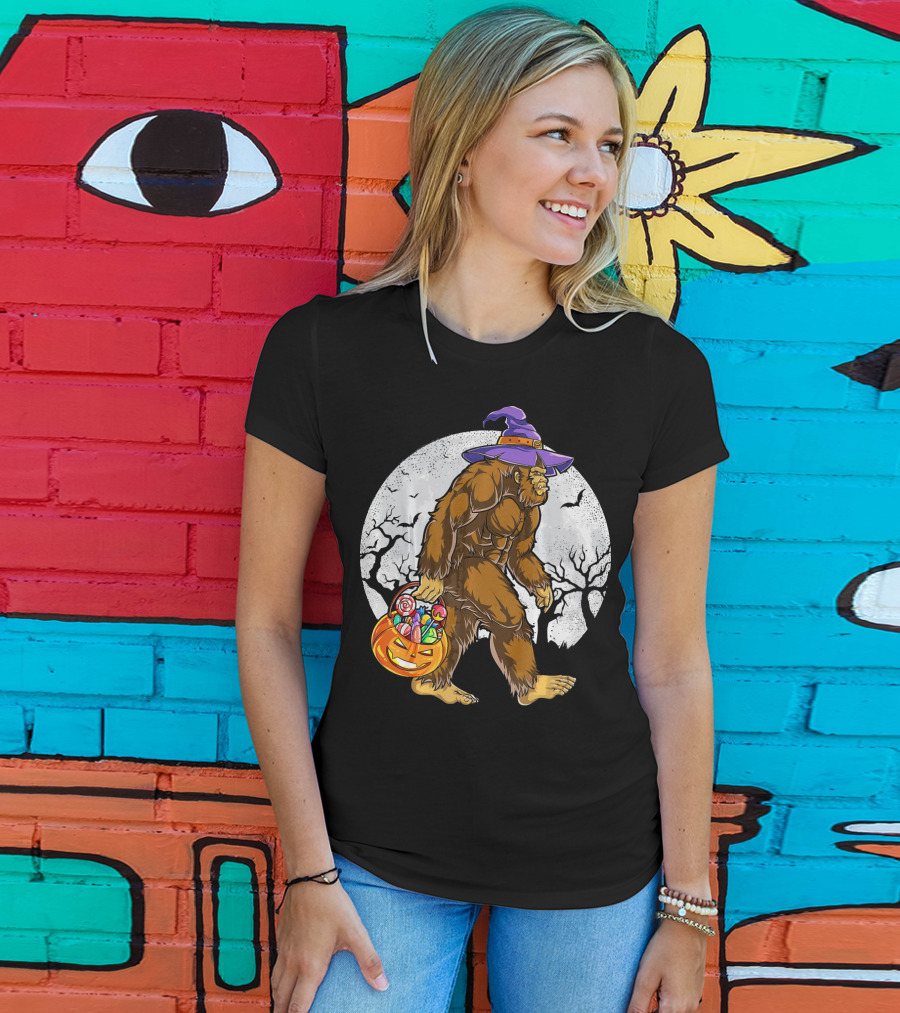 Bigfoot Witch Carrying Pumpkin Candy Basket In Spooky Moonlit Forest T-Shirt