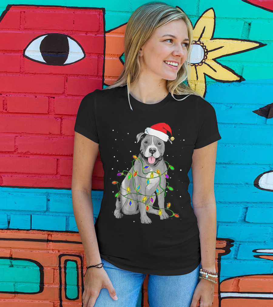 Pitbull In Santa Hat Wrapped In Christmas Lights With Snowy Background T-Shirt
