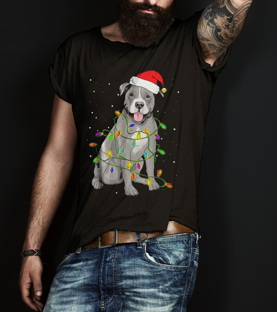 Pitbull In Santa Hat Wrapped In Christmas Lights With Snowy Background T-Shirt