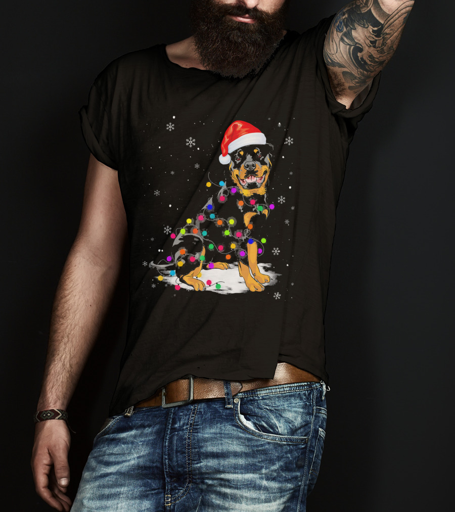 Rottweiler With Santa Hat And Colorful Christmas Lights In Snowy Scene T-Shirt